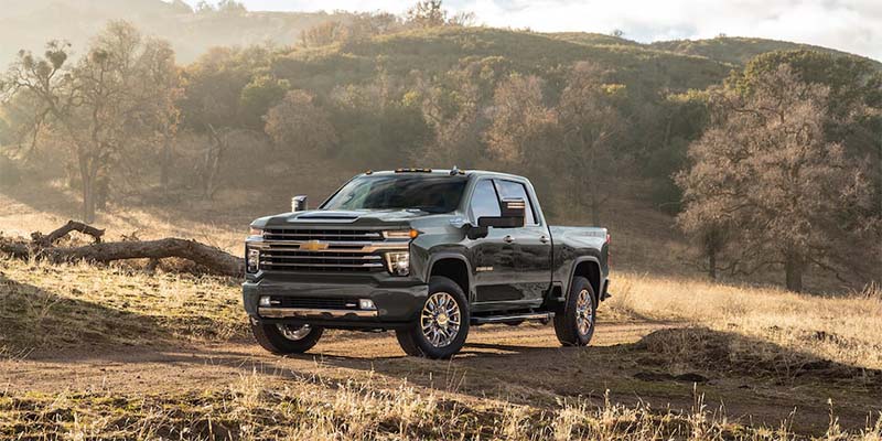 brand new 2023 Chevrolet Silverado 2500 on a back country dirt road