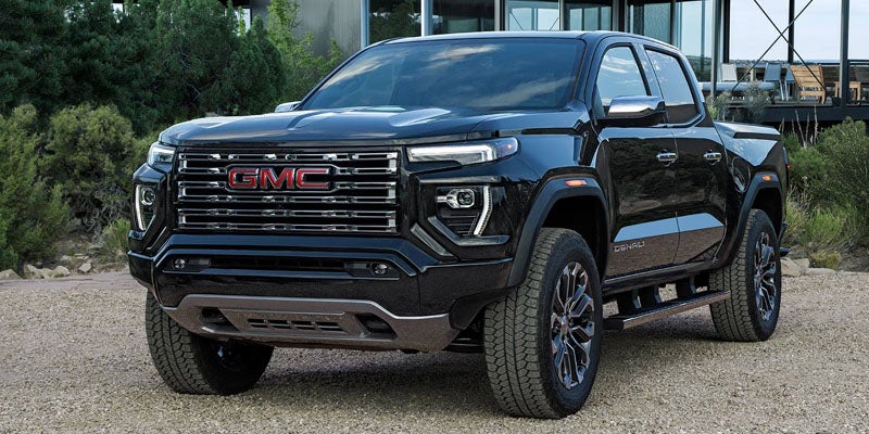 2026 GMC Canyon shown from the rear three-quarter view with the tailgate closed